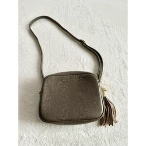Light gray genuine leather made in Italy crossbody with tassel and zipper close￼